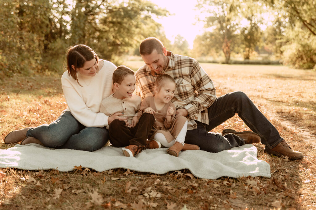 A family posing for a candid photo at Oak Ridge Park in New Jersey