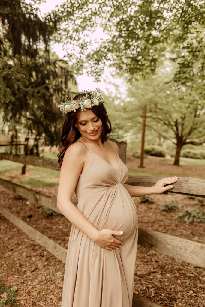 A pregnant woman posing for a photo at Colonial Park in Somerset County, New Jersey. 