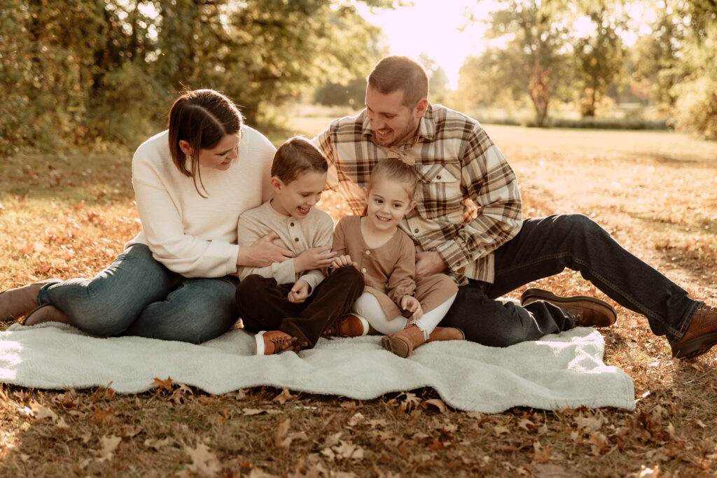 a family posing for a photo in Fall in Union County, New Jersey