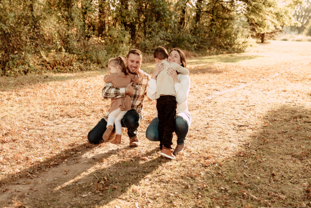 children running during a fall family photo session in New Jersey