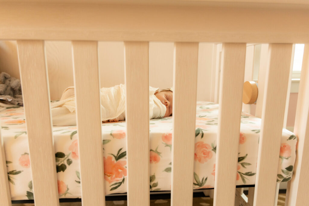 a newborn girl posing for a newborn photo in a home in New Jersey